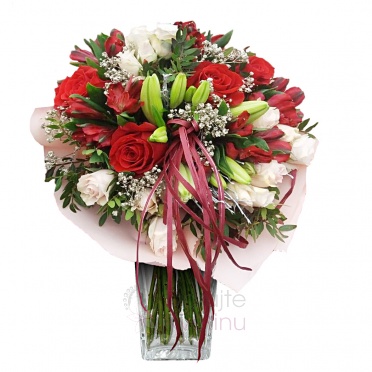 Bouquet of sunflowers, roses, gerberas, santini, greenery